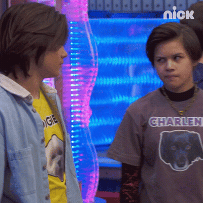 Boy In Charlen Shirt Next To Boy In Yellow Shirt GIF