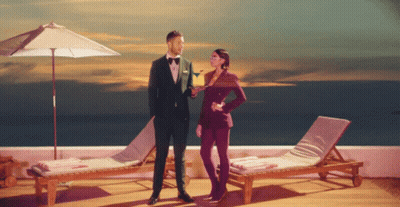Boy In Cowboy Boots And Bow Tie Standing In Store GIF