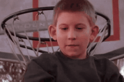 Boy In Front Of Basketball Hoop Saying Hoop GIF