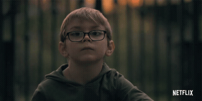 Boy In Glasses And Green Hoodie Netflix Ad GIF
