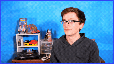 Boy In Glasses Blue Wall GIF