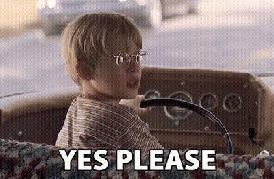 Boy In Glasses Driving Car Saying Yes Please GIF