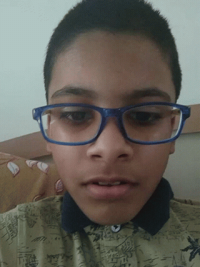 Boy In Glasses Wearing Hawaii Shirt GIF