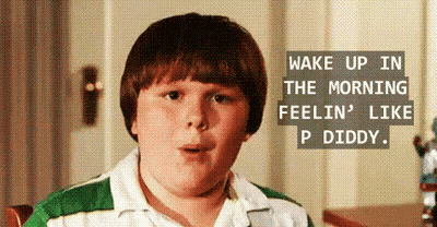 Boy In Green And White Shirt Sitting At Table With Quote GIF