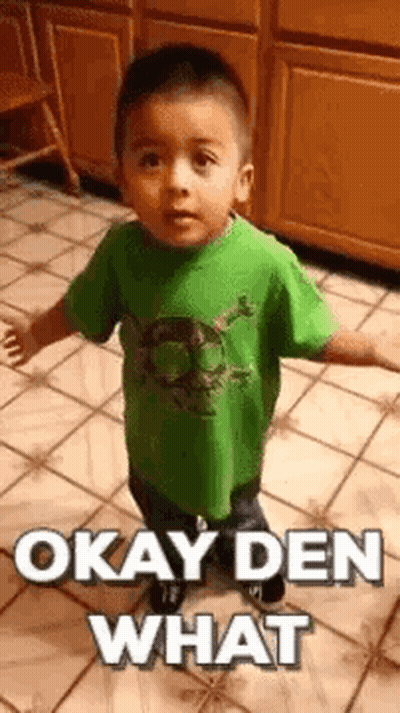 Boy In Green Shirt Making Funny Face GIF