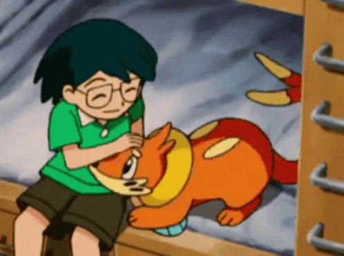 Boy In Green Shirt Petting Cartoon Animal GIF