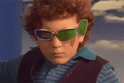 Boy In Green Sunglasses And Blue Shirt GIF