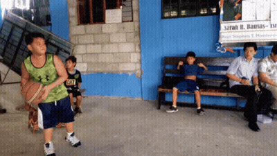 Boy In Green Under Armour Tank Top Holding Basketball GIF