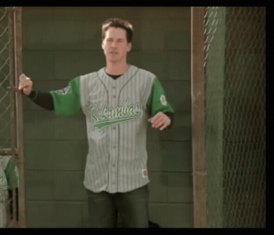 Boy In Green White Baseball Uniform Holding Bat GIF