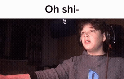 Boy In Headphones Making Funny Face At TV GIF