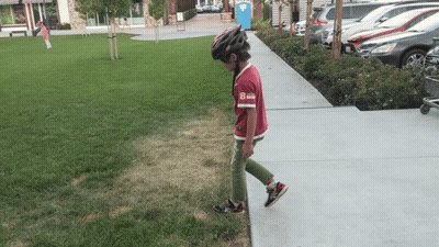 Boy In Helmet And Red Shirt Number 8 GIF