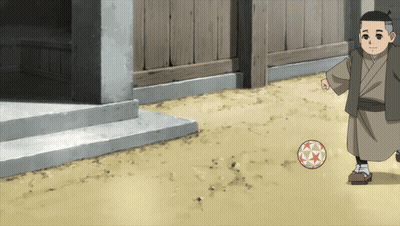 Boy In Kimono Kicking A Ball GIF