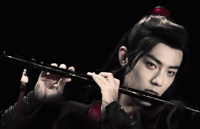 Boy In Kimono Playing Flute Blue Polka Dots GIF
