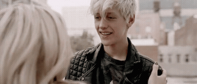 Boy In Leather Jacket Smiling GIF