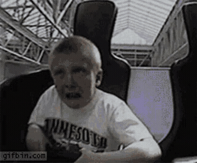 Boy In Minnesota T-Shirt Riding Roller Coaster GIF