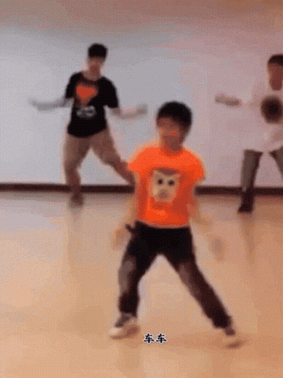 Boy In Orange Shirt With Monkey Face GIF