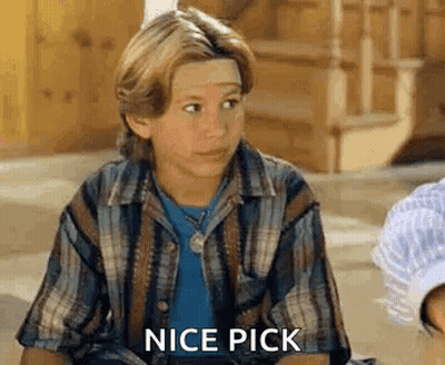 Boy In Plaid Shirt Sitting On Ground GIF