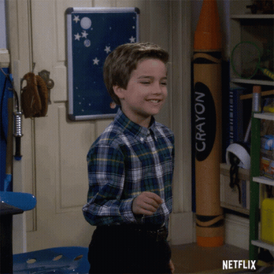 Boy In Plaid Shirt Standing Before Crayon GIF