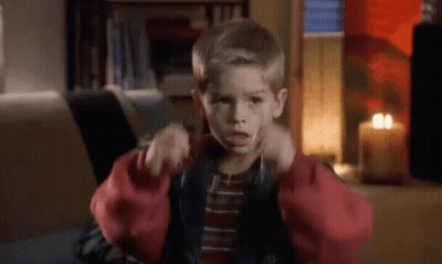 Boy In Red Jacket Pointing GIF