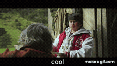 Boy In Red Jacket Talking To Older Man GIF
