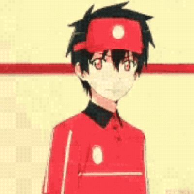 Boy In Red Shirt And Hat Standing Before Yellow Wall GIF