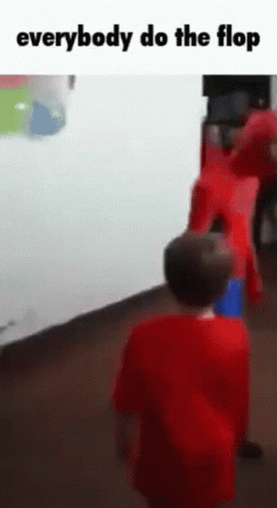 Boy In Red Shirt In Front Of Group GIF