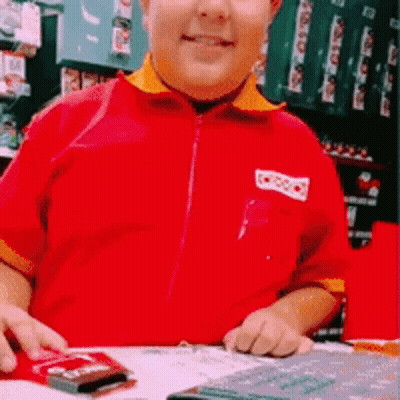Boy In Red Shirt Saying Coca Cola GIF