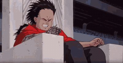 Boy In Red Shirt Sitting On Concrete Block GIF