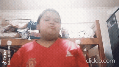 Boy In Red Shirt With Manchester United Logo GIF