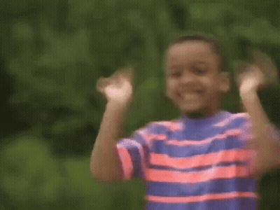Boy In Red Striped Shirt Holding Red Object GIF