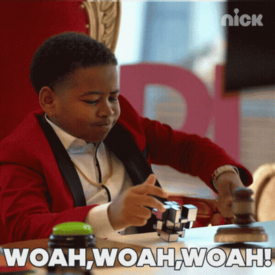 Boy In Red Suit Playing Puzzle Saying Woah Woah Woah GIF