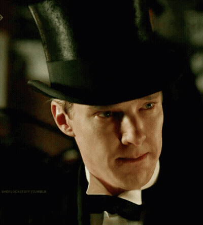 Boy In Respect Hat Sitting In Crowd GIF