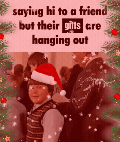 Boy In Santa Hat Saying Hi To Friend With Gifts GIF