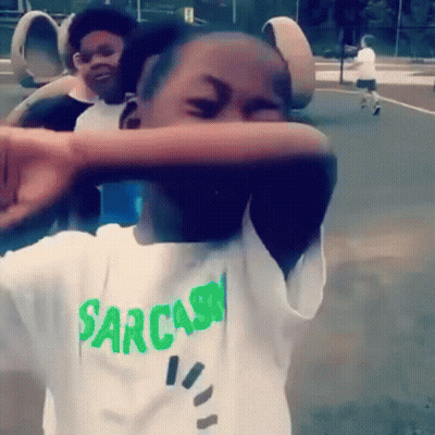 Boy In Sarcasm Shirt Covering Face GIF