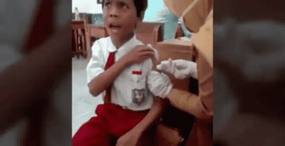 Boy In School Uniform Getting Vaccine GIF