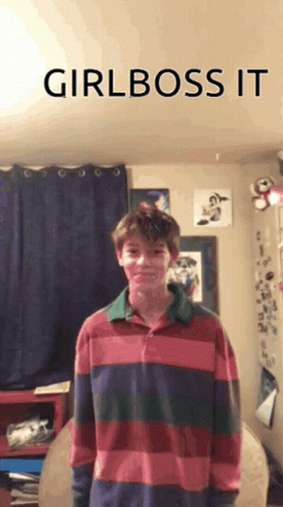 Boy In Striped Shirt In Front Of Girl Boss Sign GIF