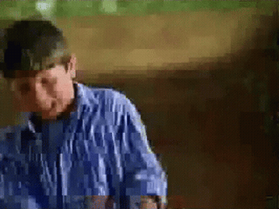 Boy In Striped Shirt Making Funny Face GIF