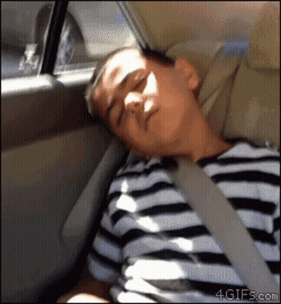 Boy In Striped Shirt Sleeping In Back Seat GIF