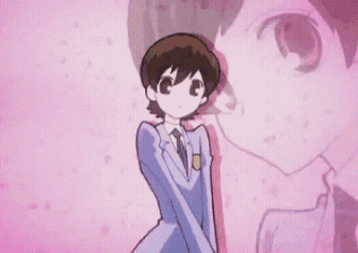 Boy In Suit And Tie In Front Of Pink Wall GIF