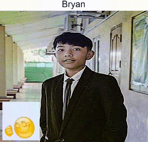 Boy In Suit And Tie Standing In Hallway With Name Bryan Above GIF
