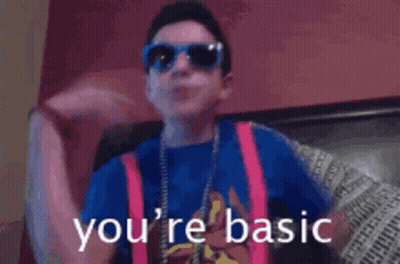 Boy In Sunglasses And Suspenders Saying You're Basic GIF