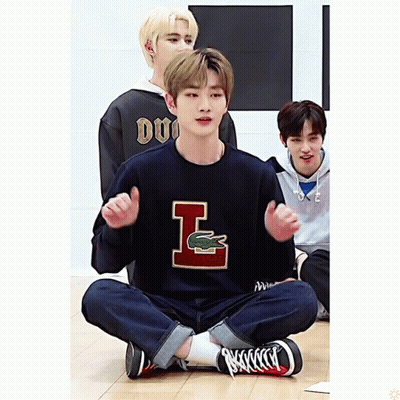 Boy In Sweater With Letter L GIF
