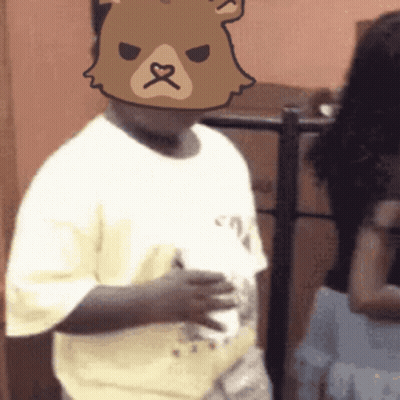 Boy In Teddy Bear Mask Holding Coffee GIF