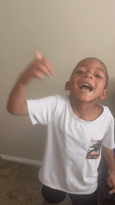 Boy In White Shirt With Palm Tree Laughing GIF