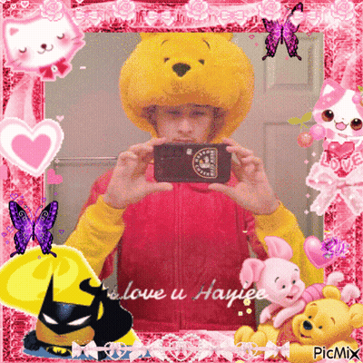 Boy In Winnie The Pooh Hat Taking Selfie In Pink Frame GIF