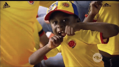 Boy In Yellow Adidas Shirt Making Face GIF
