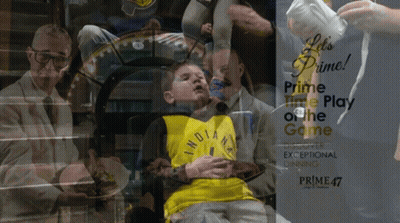 Boy In Yellow Indiana Jersey Sits In Front Of Prime Time Play Of The Game Poster GIF