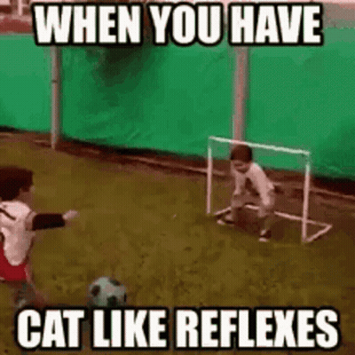 Boy Kicking Soccer Ball While Another Watches GIF