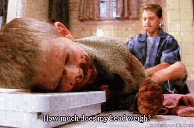 Boy Laying On A Scale Saying How Much Does My Head Weigh GIF