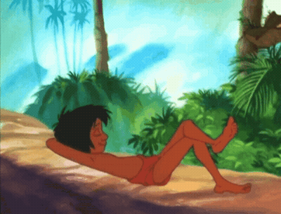 Boy Laying On Ground In Jungle GIF